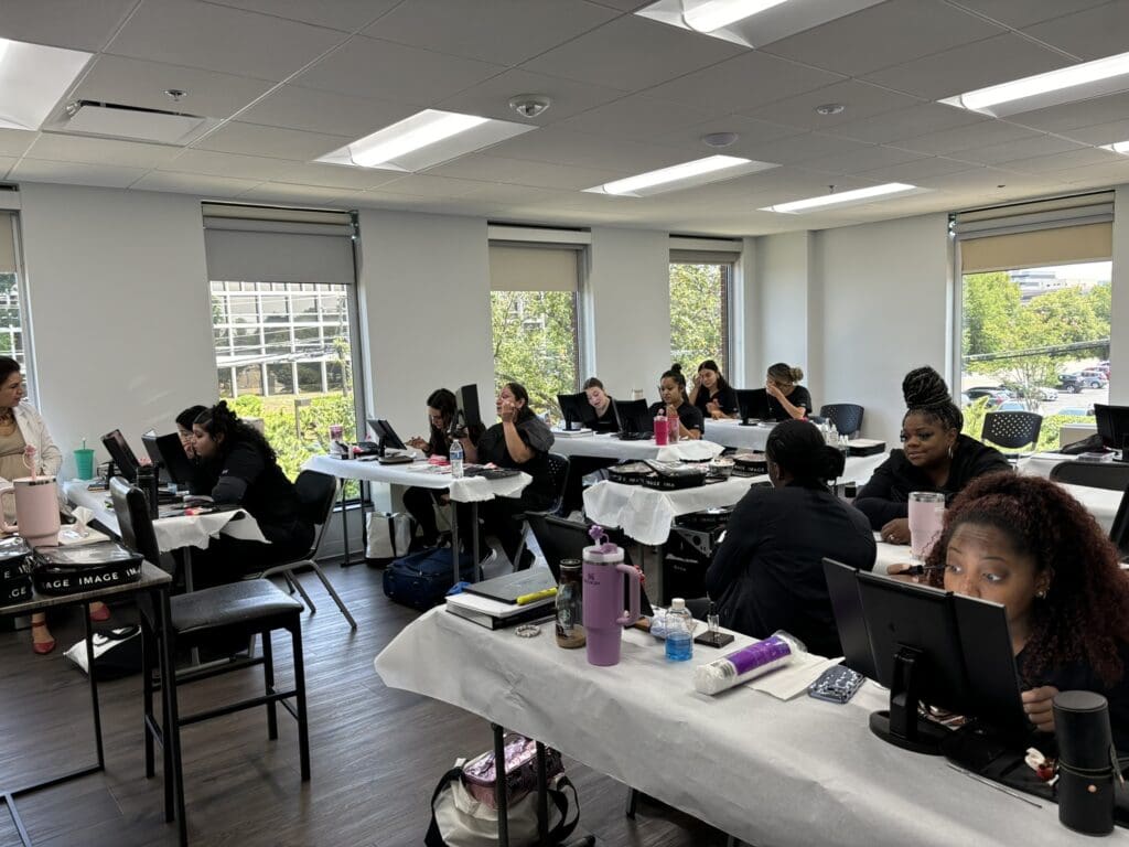 Classroom with students working on computers.